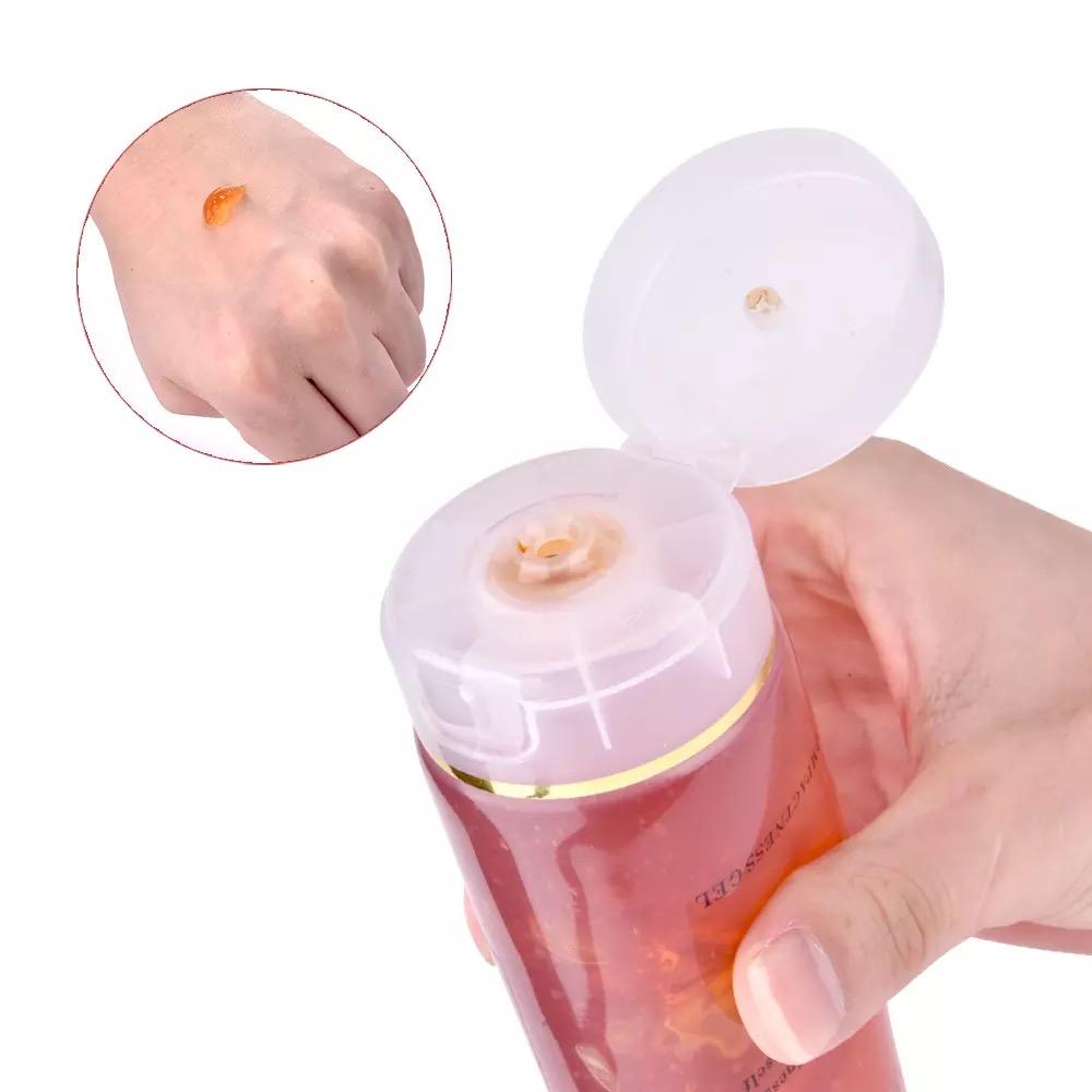 Open Tube of Spotless Upgrade Conductive Gel for Body, Dab of Gel on Hand